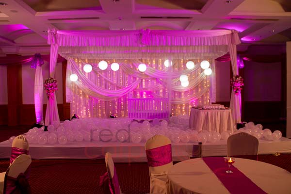 Hotel Radisson Blu facilities: Pink & white theme birthday  stage decor